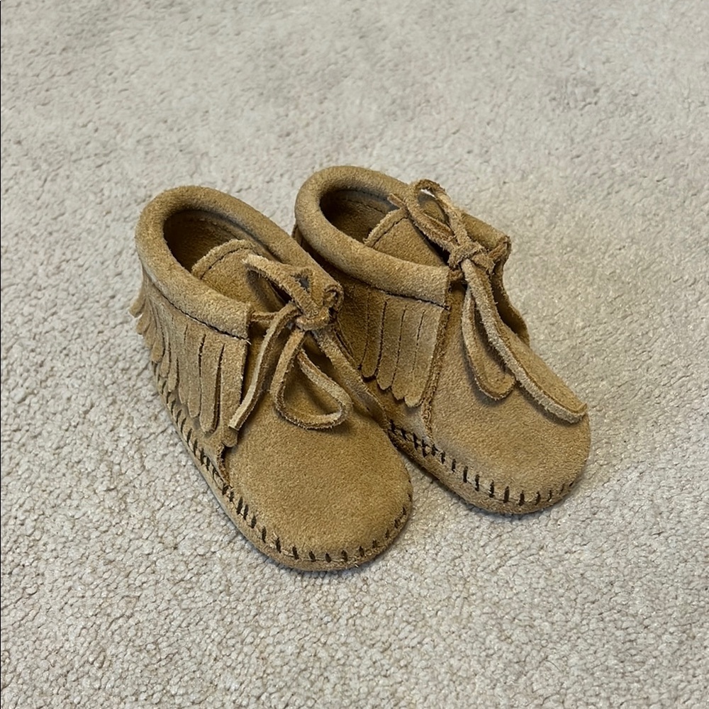 Brand new: Minnetonka Tan Moccasin Shoes with Fringe Detail